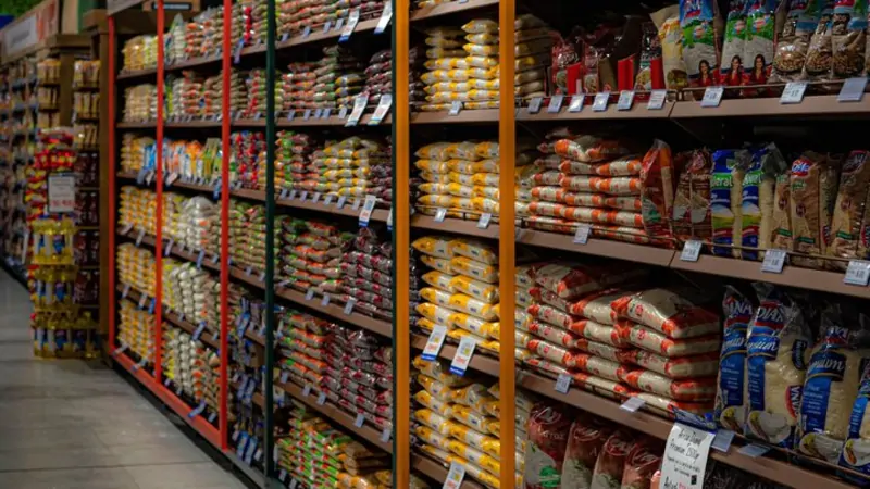 Stocked grocery aisle in a retail store