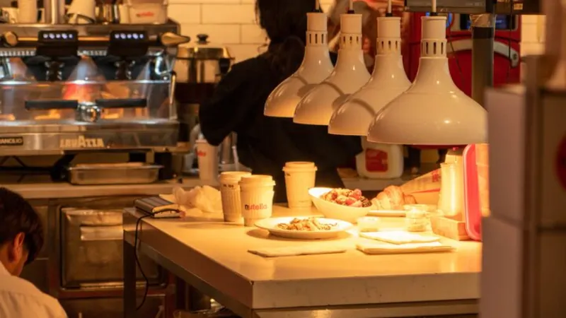 Cafe service counter with coffee equipment