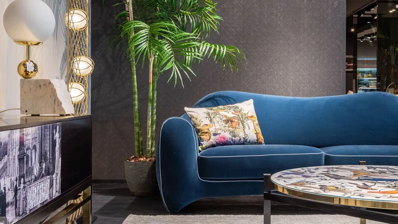 A furniture showroom display with sofa and lighting