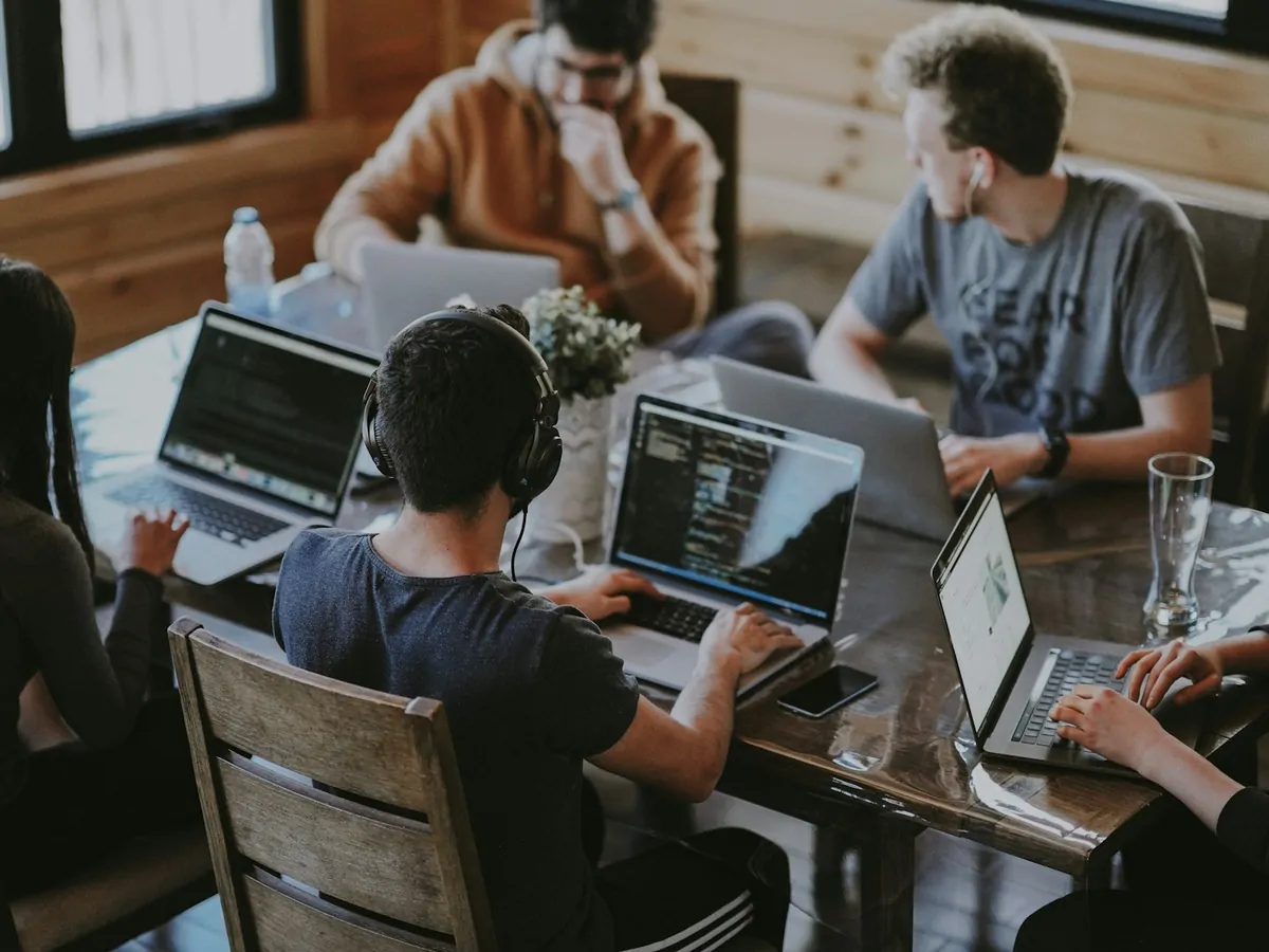 Silex engineers working together at laptops around a table